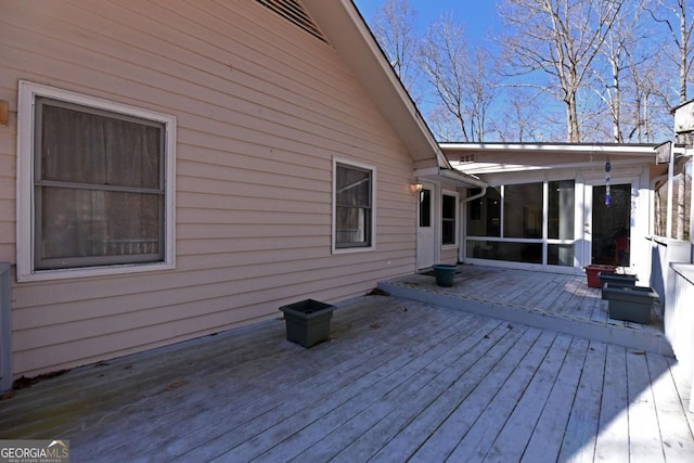 deck featuring a sunroom