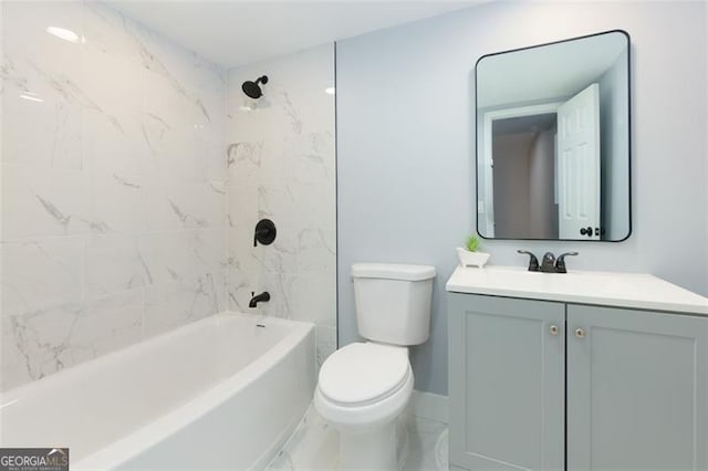 full bathroom featuring vanity, toilet, and tiled shower / bath combo