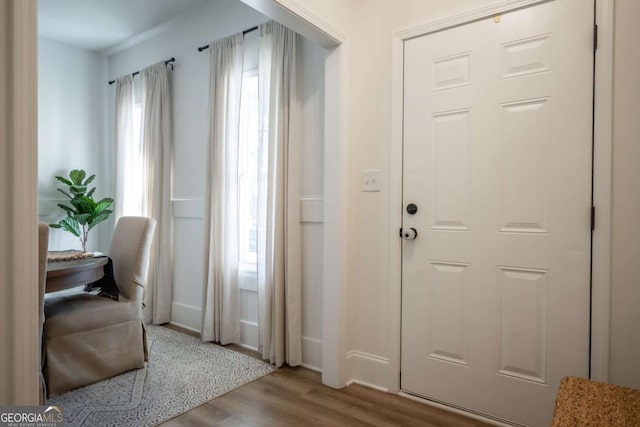 doorway to outside featuring hardwood / wood-style flooring