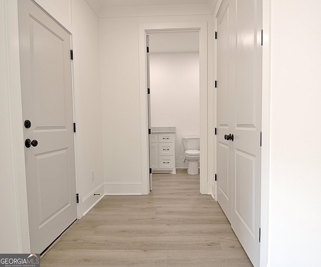 hallway featuring light wood-type flooring