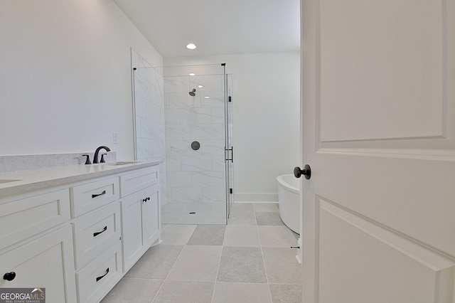 bathroom with vanity and walk in shower