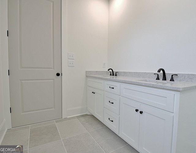 bathroom featuring vanity and tile patterned flooring