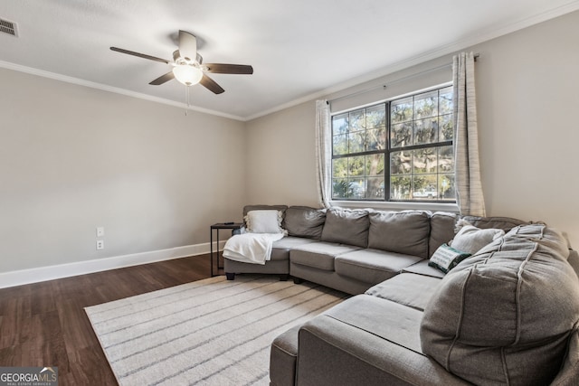 living room featuring dark hardwood / wood-style flooring, ornamental molding, and ceiling fan