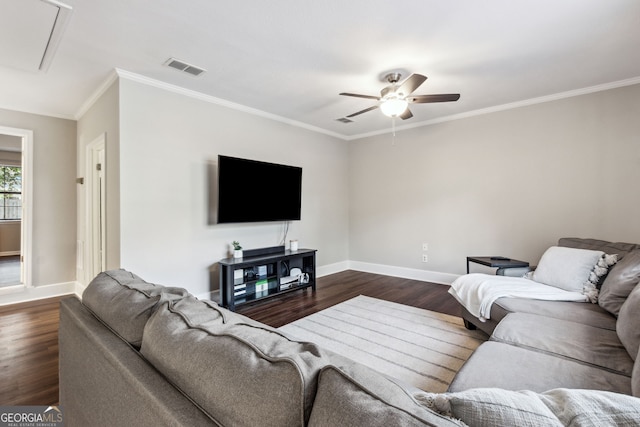 living room with dark wood-type flooring, ceiling fan, and ornamental molding