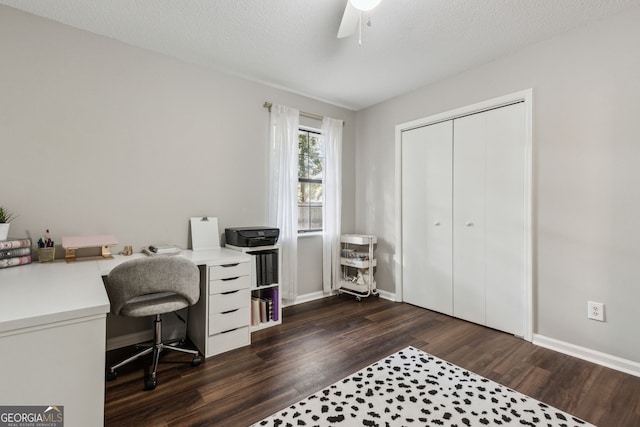 office featuring ceiling fan, dark hardwood / wood-style floors, and a textured ceiling