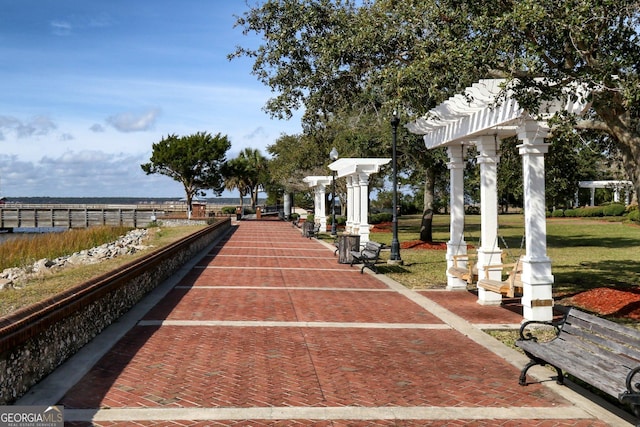 view of home's community featuring a pergola