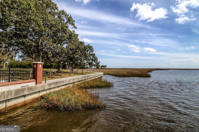 view of community featuring a water view