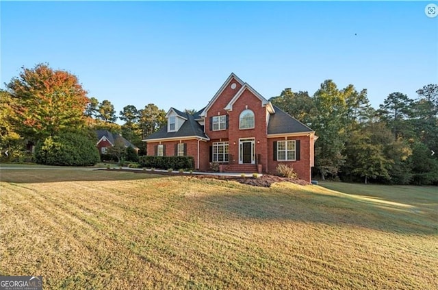 view of property featuring a front yard