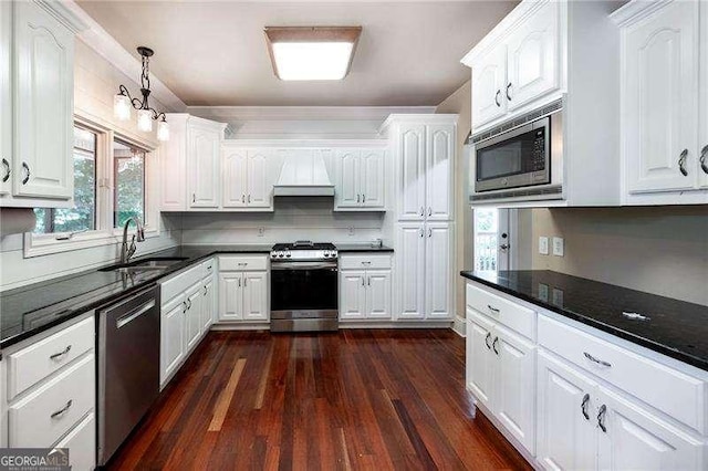 kitchen featuring white cabinetry, sink, and stainless steel appliances