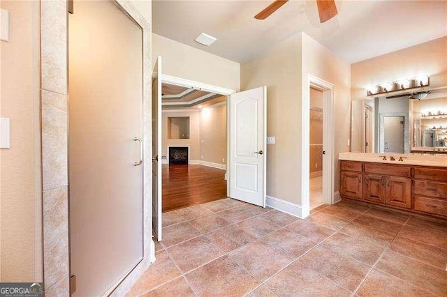 bathroom with vanity and ceiling fan