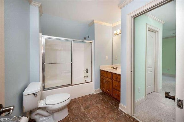 full bathroom with vanity, crown molding, combined bath / shower with glass door, and toilet