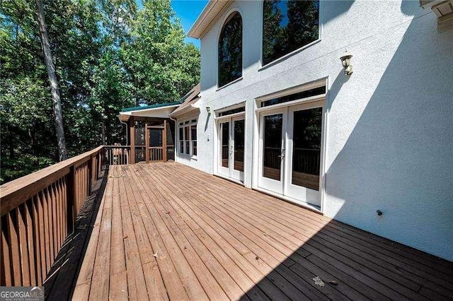 wooden deck with french doors