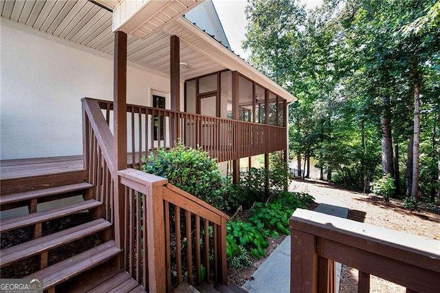 view of side of property with a sunroom