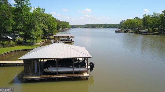 dock area featuring a gazebo and a water view