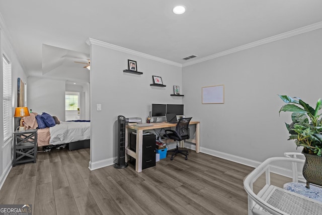 office with hardwood / wood-style flooring, ceiling fan, and ornamental molding