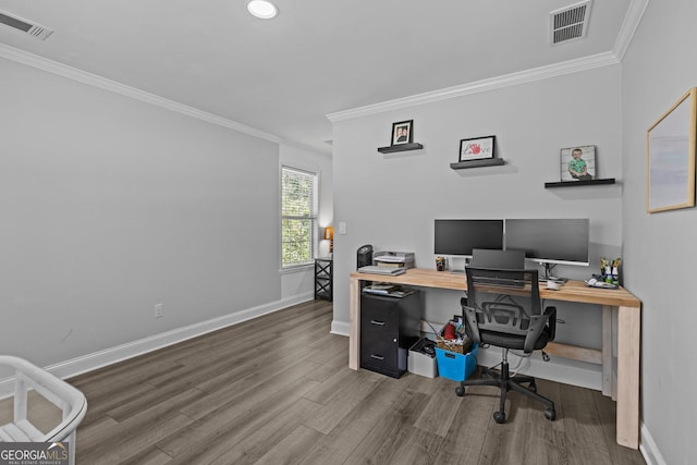 home office featuring wood-type flooring and ornamental molding