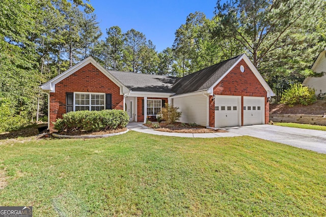 view of front of home featuring a garage and a front lawn