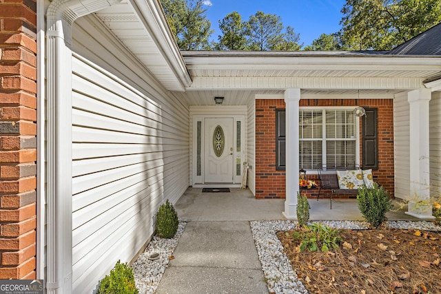 entrance to property with covered porch