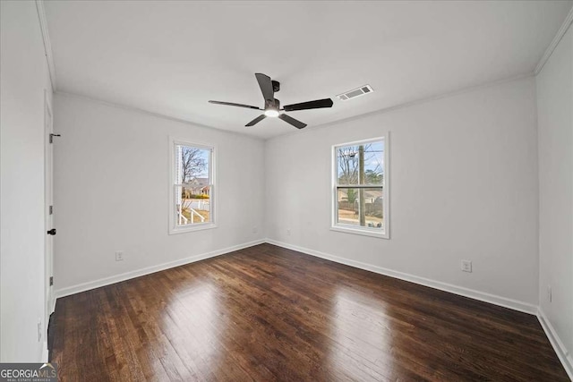 unfurnished room featuring ornamental molding, dark hardwood / wood-style floors, and ceiling fan