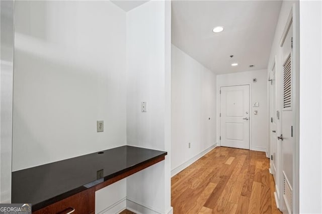 corridor featuring light wood-type flooring