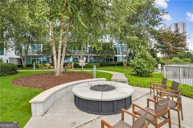 view of patio / terrace featuring an outdoor fire pit