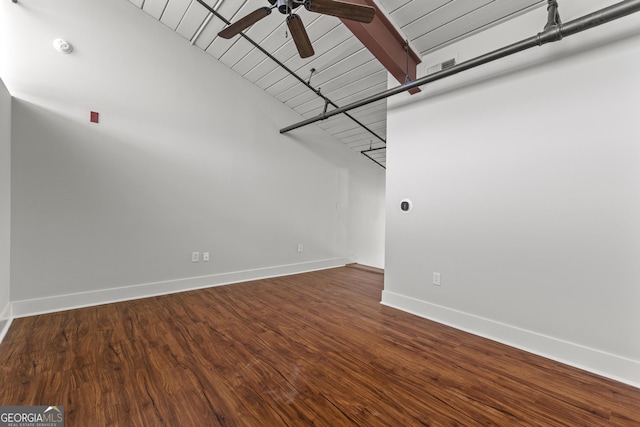 interior space featuring wood-type flooring, ceiling fan, and beam ceiling