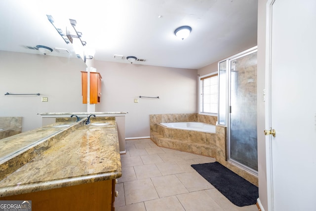 bathroom with vanity, tile patterned floors, and independent shower and bath