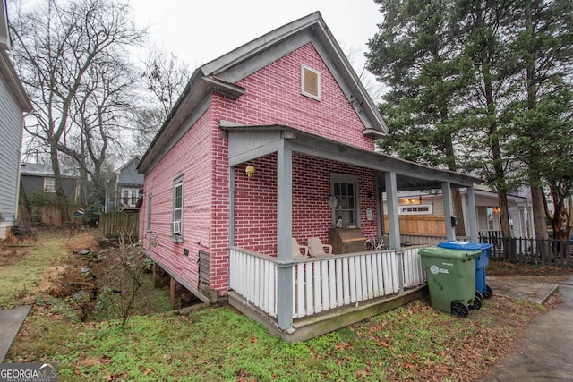 view of home's exterior with covered porch