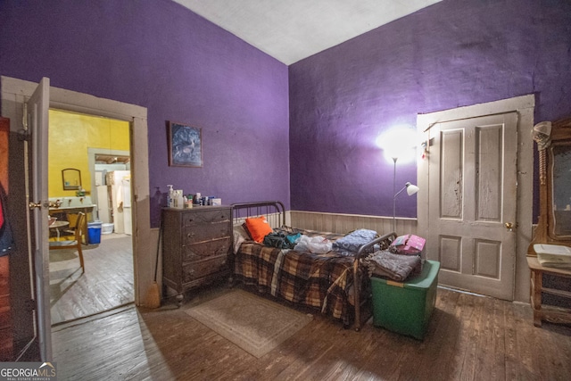 bedroom featuring hardwood / wood-style flooring