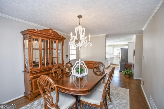 dining room with baseboards, a textured ceiling, ornamental molding, and dark wood-style flooring