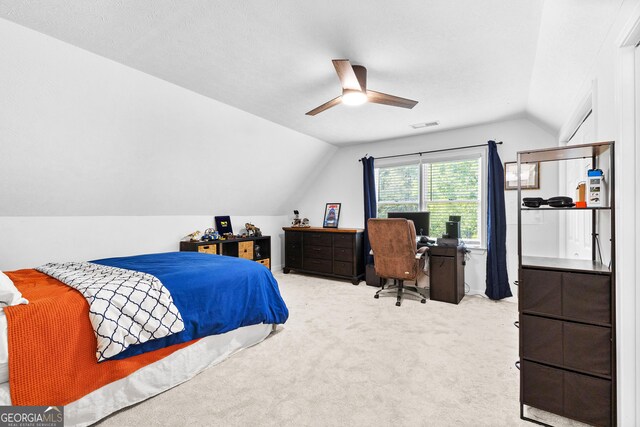 bedroom with light colored carpet