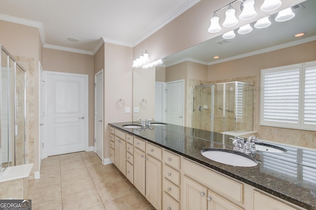 6706 Amherst Dr, Hoschton, GA 30548 - bathroom featuring a shower stall, double vanity, tile patterned floors, and ornamental molding