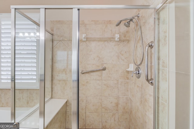 bathroom featuring an enclosed shower