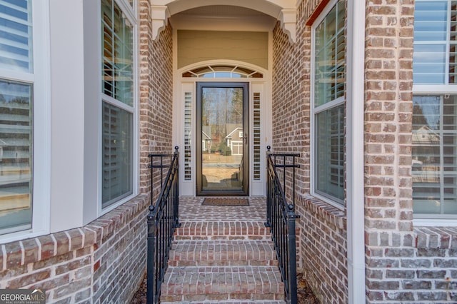 6706 Amherst Dr, Hoschton, GA 30548 - view of exterior entry with brick siding