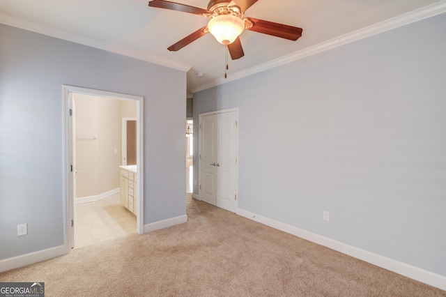 unfurnished bedroom with light carpet, ensuite bath, ornamental molding, and ceiling fan