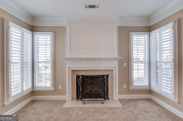 6706 Amherst Dr, Hoschton, GA 30548 - unfurnished living room with ornamental molding, carpet, and a fireplace with flush hearth