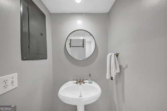 bathroom featuring sink and electric panel