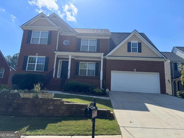 view of front of property with a garage