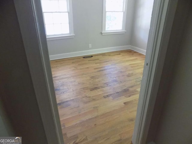 empty room featuring light hardwood / wood-style floors