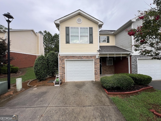 view of front of property with a garage