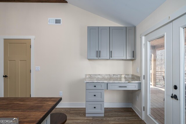 122 Acadia Dr Unit 110, Ellijay, GA 30540 - unfurnished office featuring built in desk, lofted ceiling, dark wood-style flooring, baseboards, and visible vents