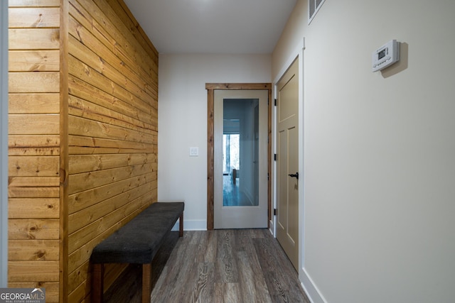 122 Acadia Dr Unit 110, Ellijay, GA 30540 - corridor with baseboards, visible vents, wood walls, and dark wood-type flooring