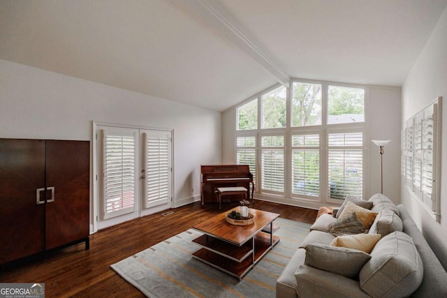 living room featuring dark hardwood / wood-style flooring and vaulted ceiling with beams