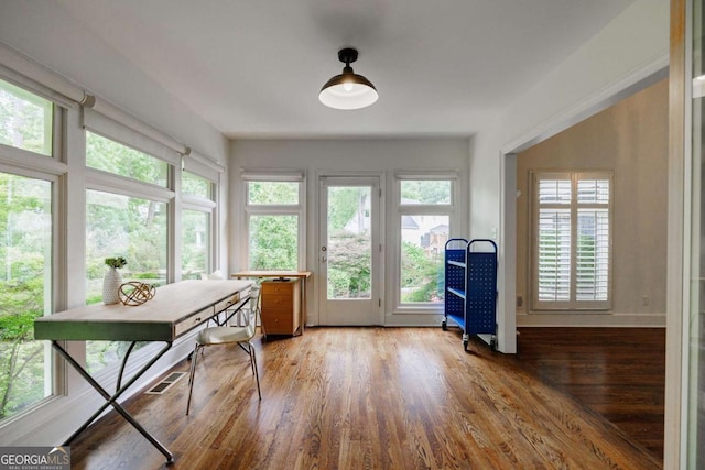 office space featuring hardwood / wood-style floors