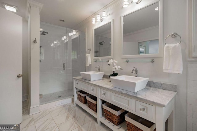 bathroom with vanity, ornamental molding, and walk in shower