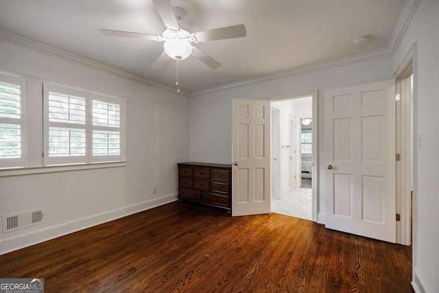 unfurnished bedroom with crown molding, ceiling fan, and dark hardwood / wood-style floors