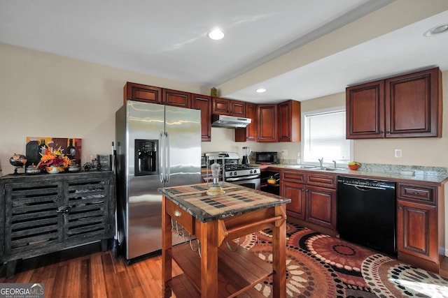 kitchen with sink, dark hardwood / wood-style flooring, and black appliances