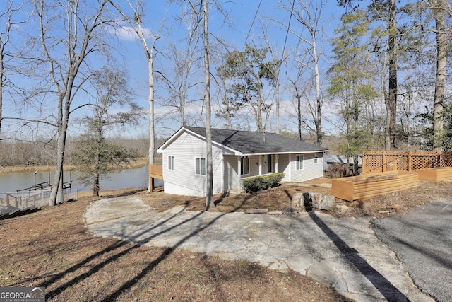 view of home's exterior featuring a water view