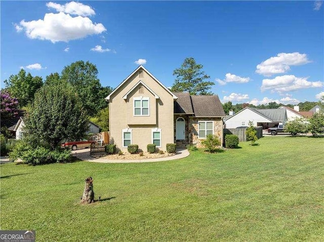 view of front of property with a front lawn