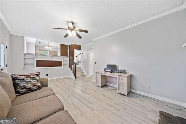 living room featuring crown molding, light hardwood / wood-style flooring, a textured ceiling, and ceiling fan